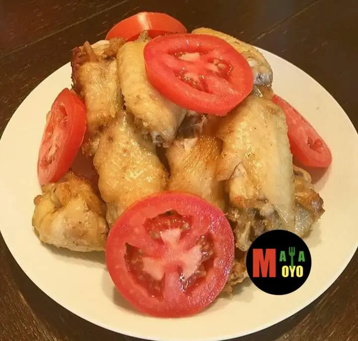 Crispy fried chicken wings catering platter — West African cuisine DMV