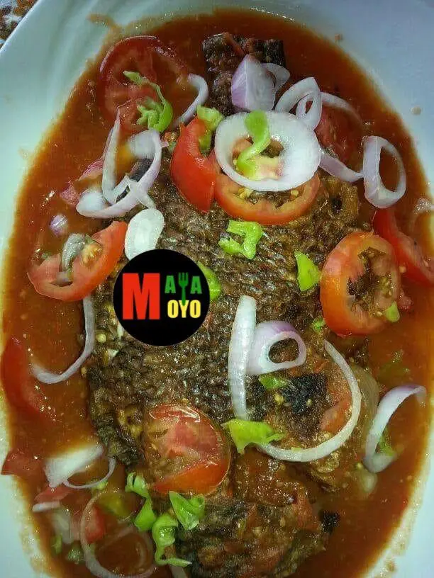 Whole grilled fish in tomato and onion sauce — MayaMoyo West African catering