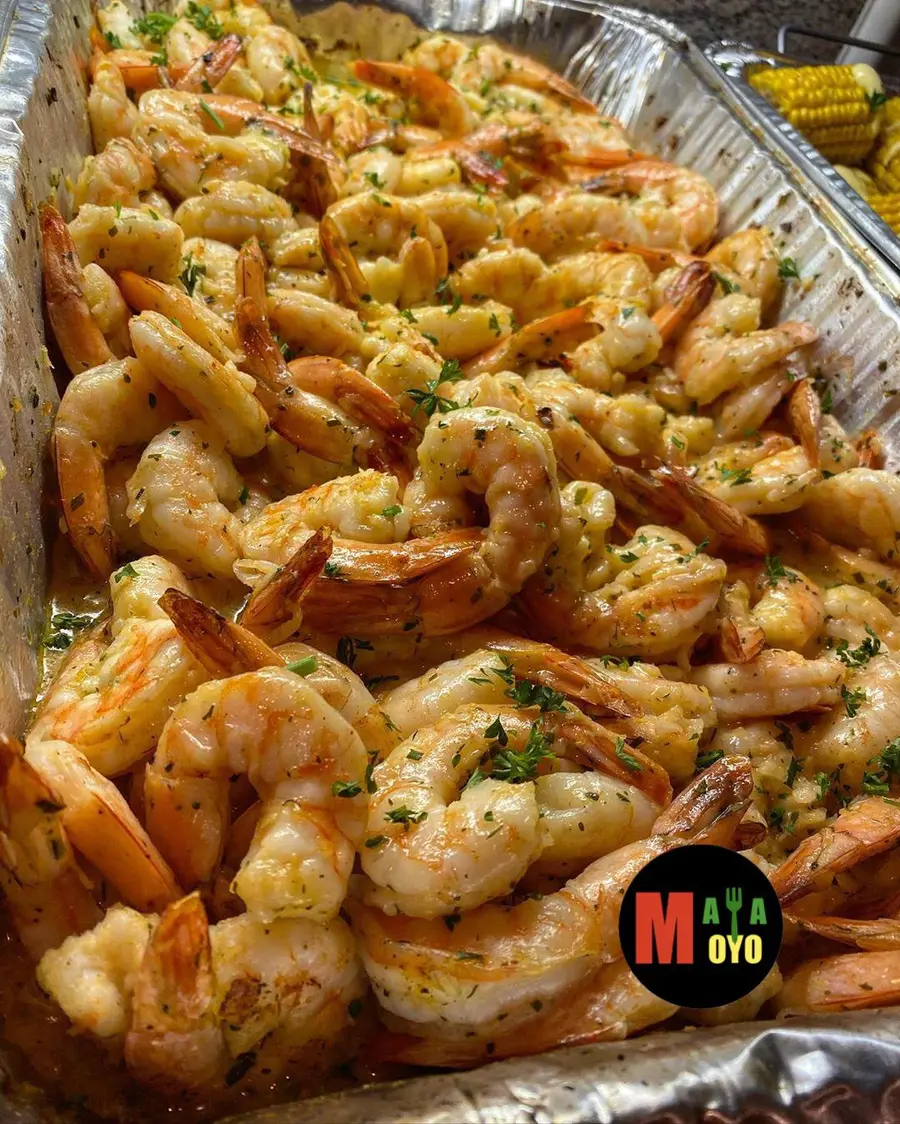 Large event tray of seasoned shrimp — African catering DMV